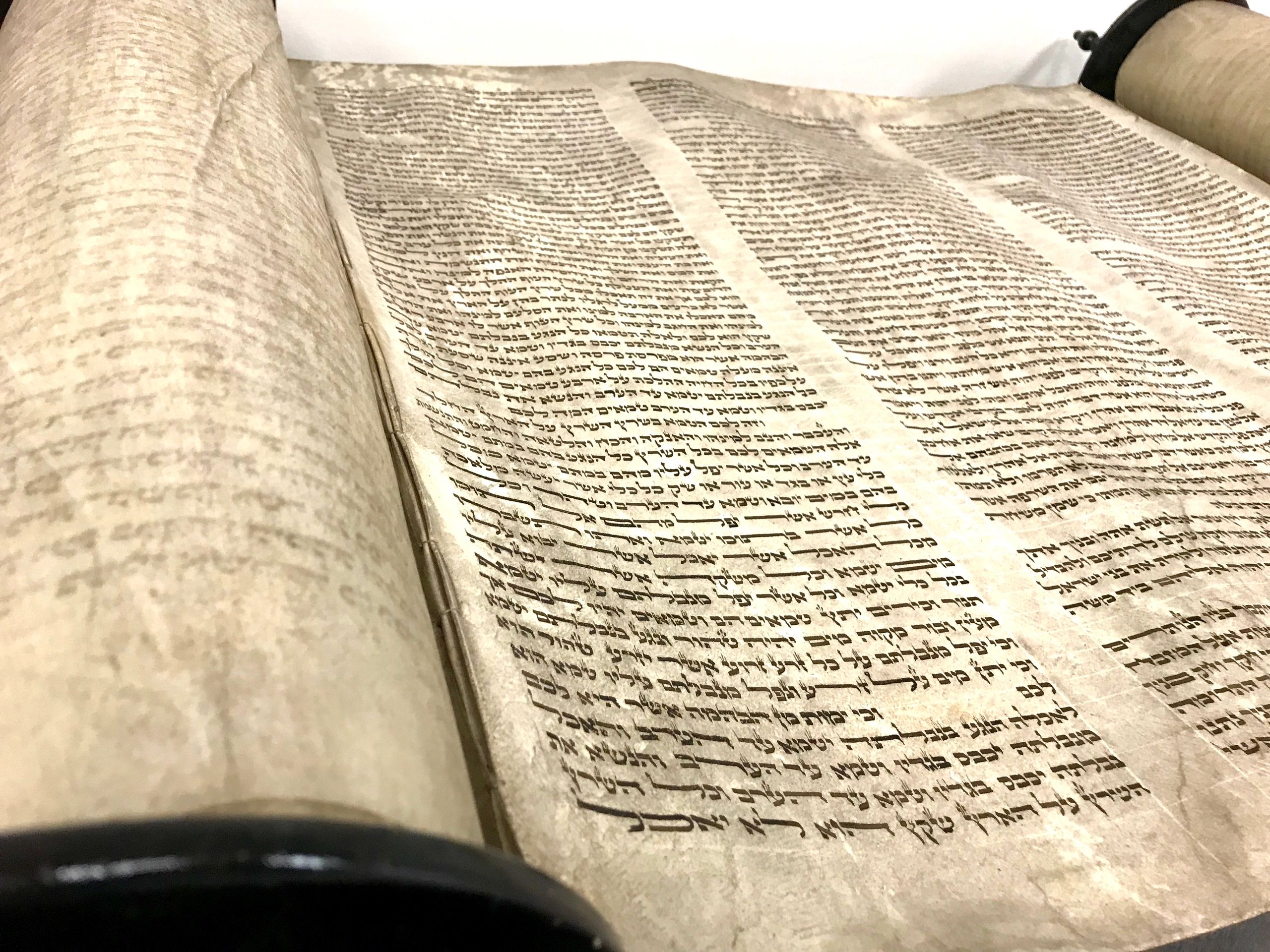Ancient scroll replica representing manuscript evidence