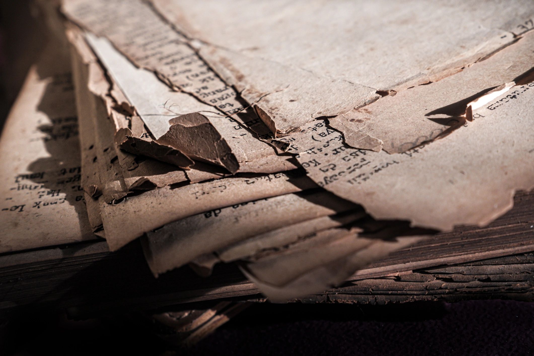 Aged manuscript pages symbolizing close study of Jewish texts and traditions
